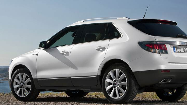 2011 Saab 9-4X Side Pose In White Near River